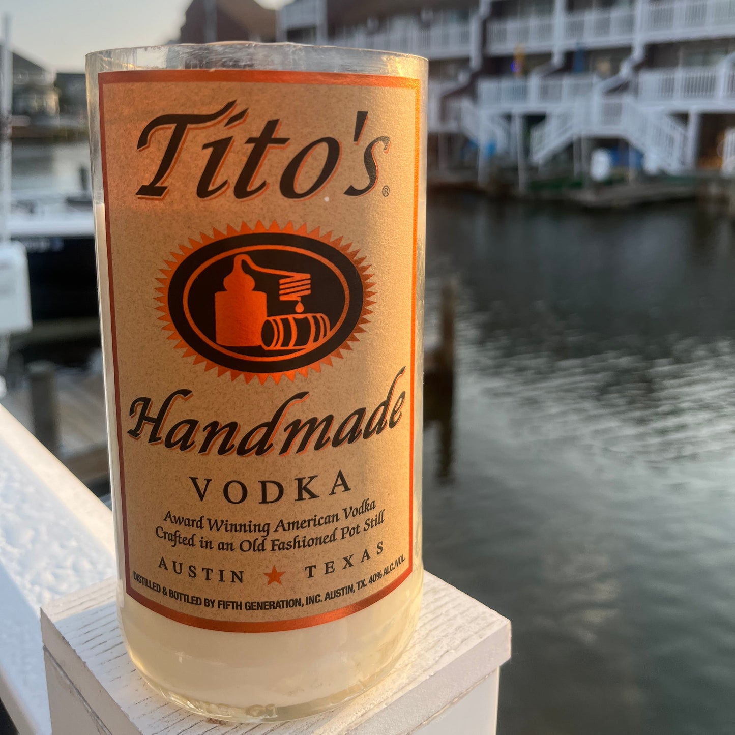Bottle of Tito's Handmade Vodka with a blurred background